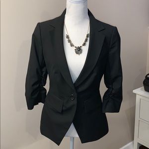 The limited XS black blazer w ruched 3/4 sleeves